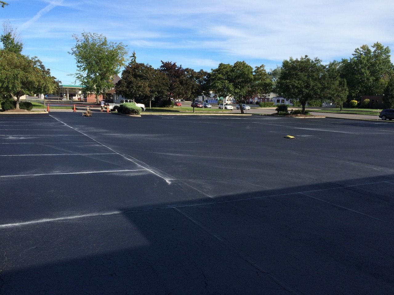 A parking lot with cars parked in it.